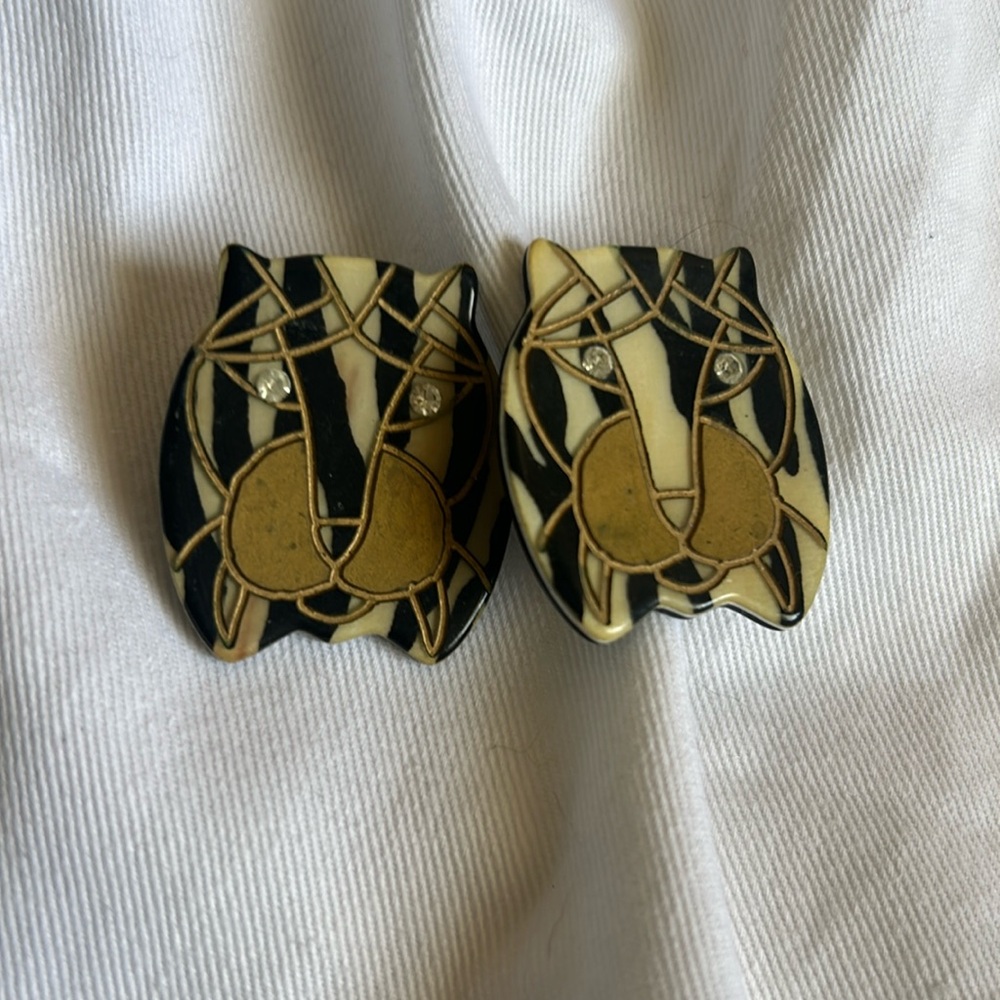 Vintage tiger post earrings with rhinestone eyes.